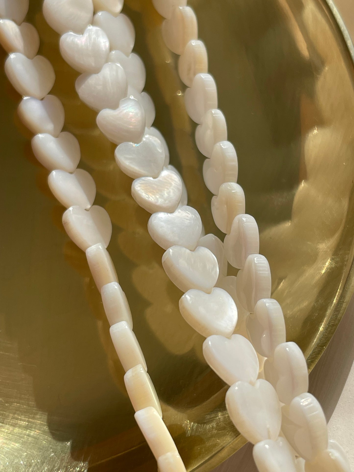 Natural Mother of Pearl heart beads - 6mm
