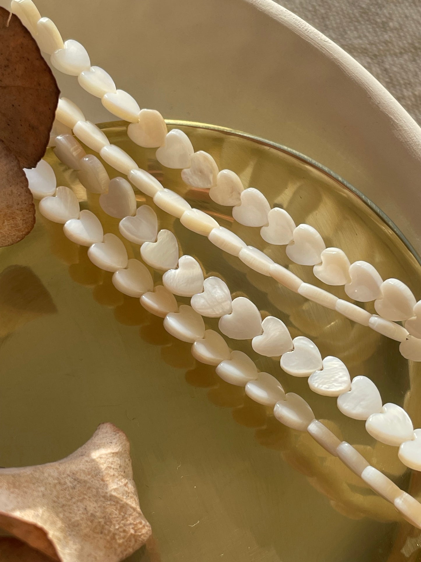Natural Mother of Pearl heart beads - 6mm